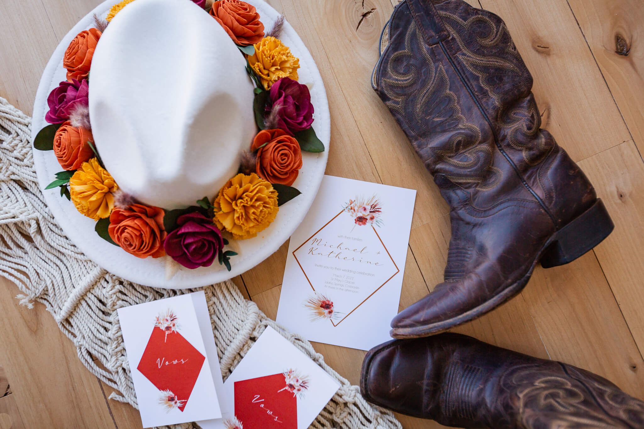 Wedding details: vow books & bride's hat and boots