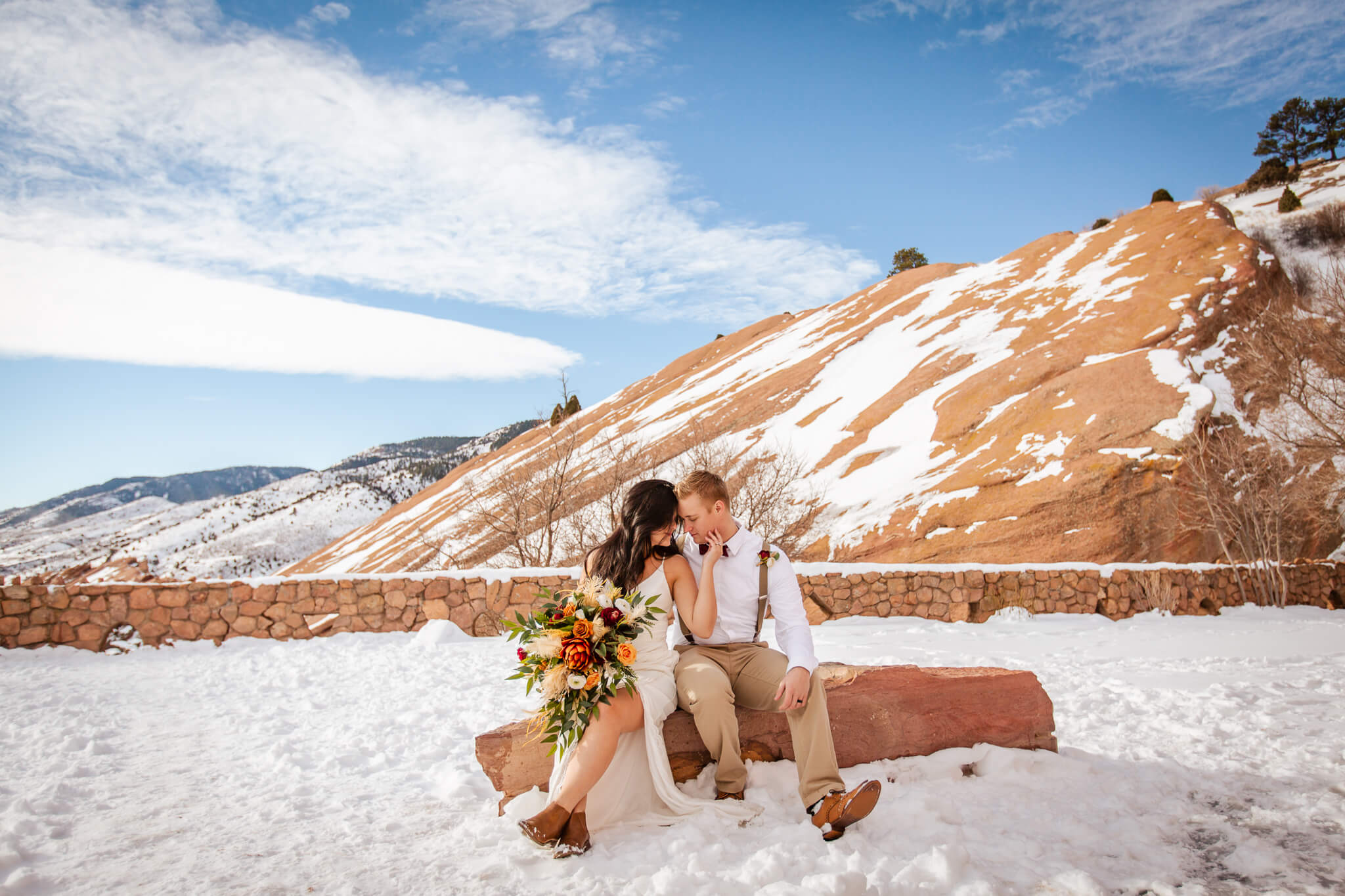 couple posing in red rocks colorado