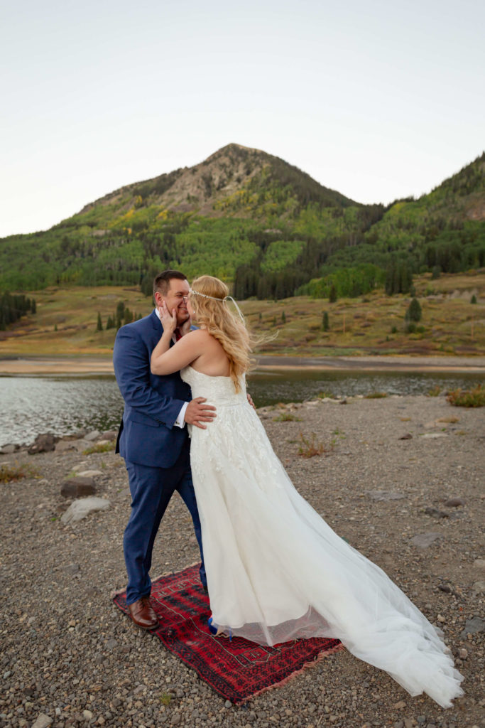 bride and groom holding each other during their Telluride elopement