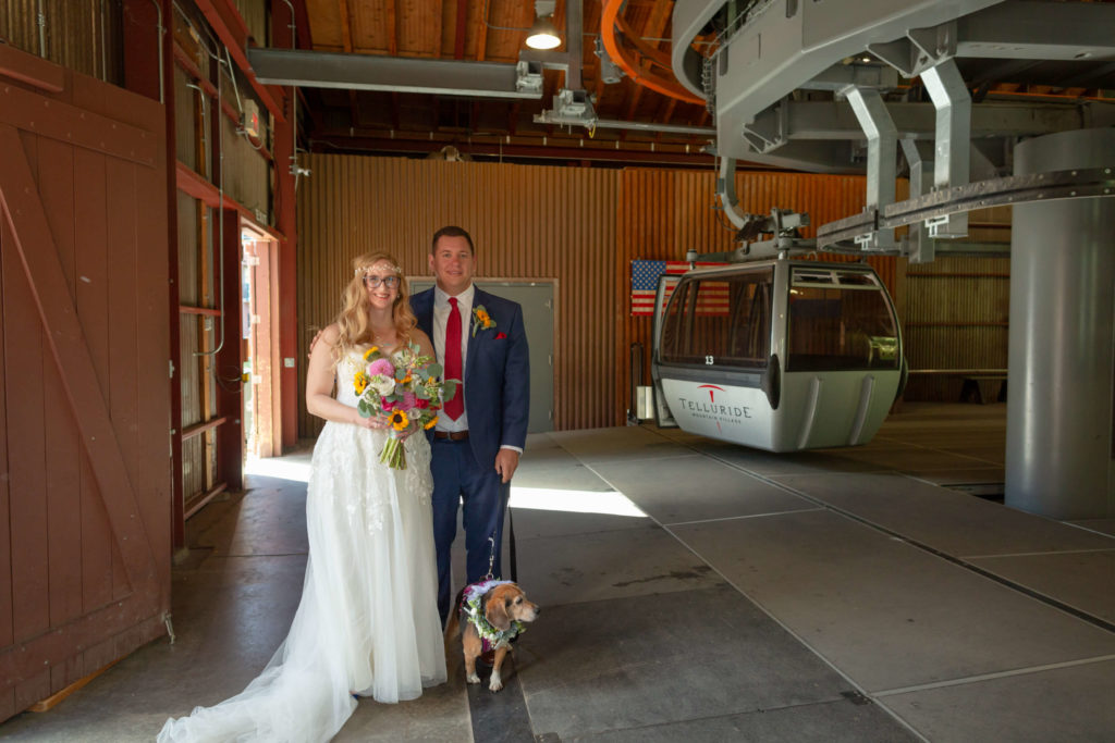 bride, groom and flower dog about to go on the gondola